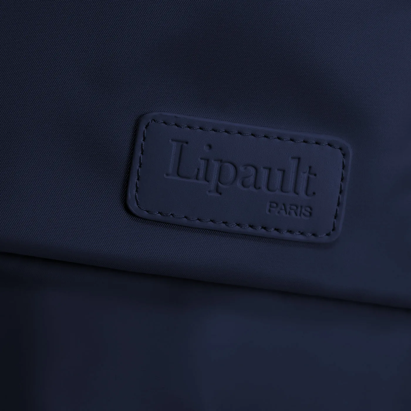 Lipault Paris 22" 4-Wheel Carry-On Luggage